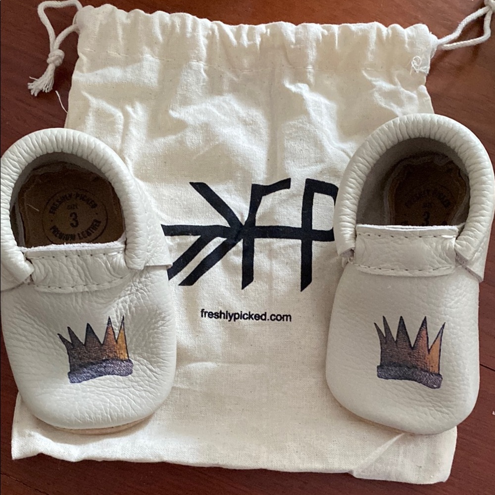 Freshly Picked White Baby Moccasins with Crown Accent